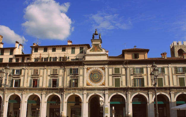 The clock tower on the Piazza della Logia in Brescia Italy