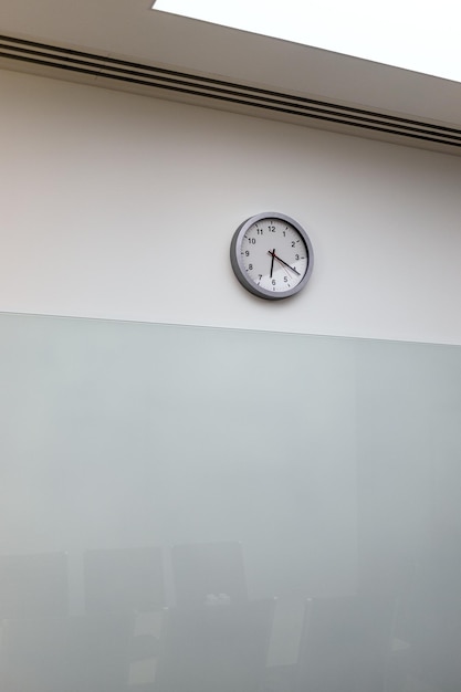 Clock on wall of empty office