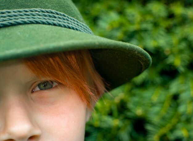 Close shot of a boy of eight years old with red hair childhood concept