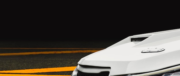 Close up of a air duct on car hood of turbo engine in a white sports car panoramic banner with copy space