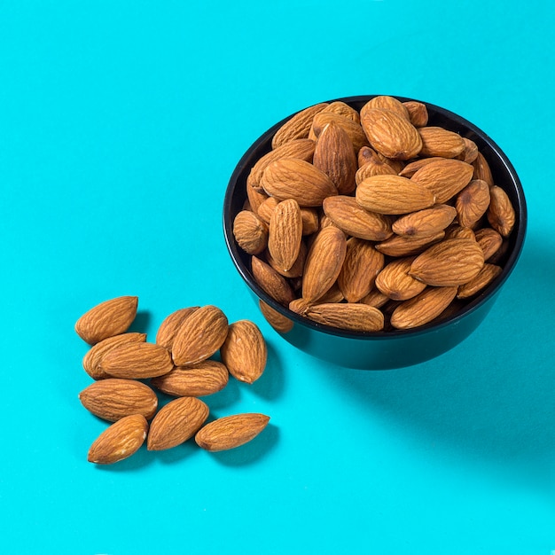 Close-up of Almonds on blue background