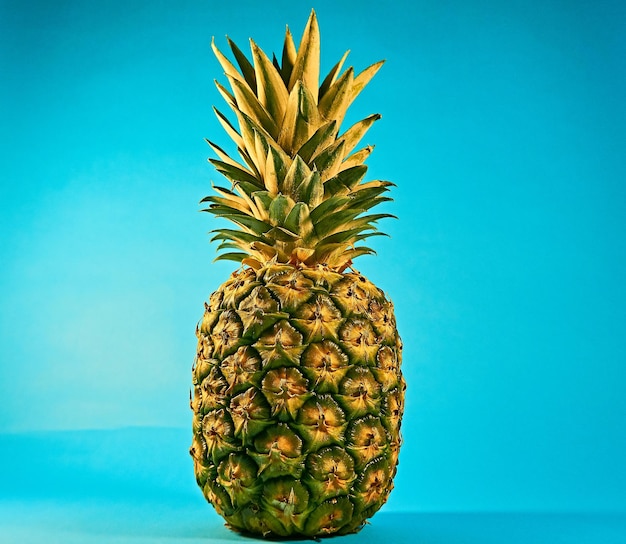 Close-up of apple against blue background