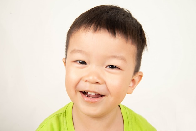 Close up Asian toddler boy smile with happy face