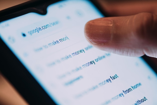 Close up back view of woman searching how to lose weight on a smartphone