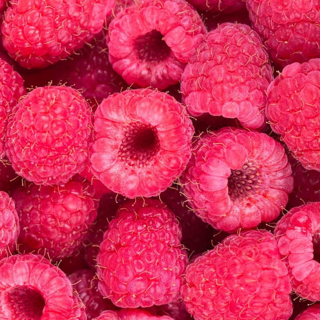 A close up background of fresh raspberries