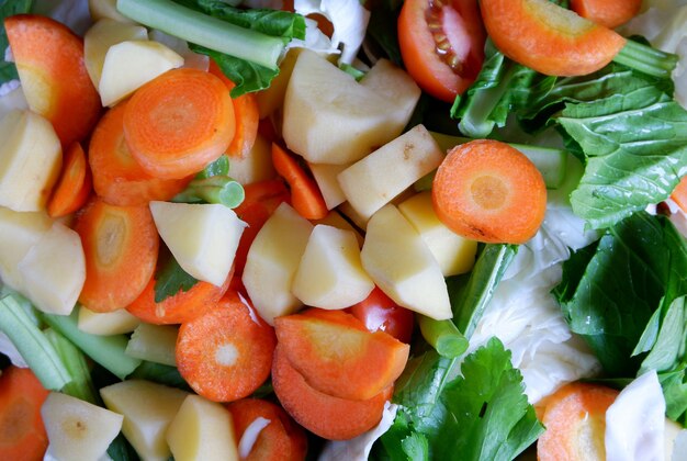 Close up background of vegetables with slices