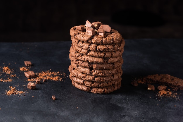 Close up baked chocolate cookies on table