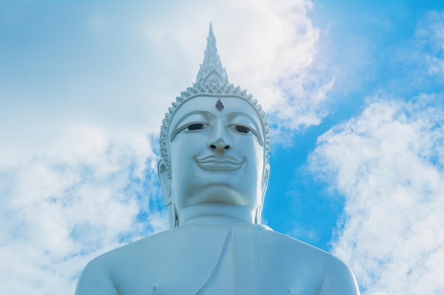 Close up of big white buddha wat phu manorom mukdahan thailand.