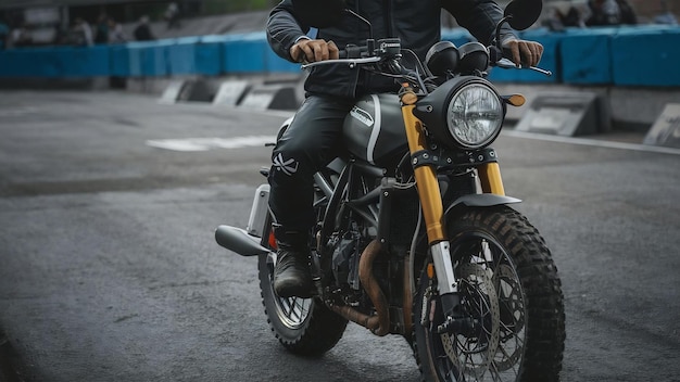 Close up of biker sitting on motorcycle before the start of the race