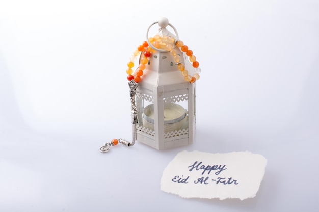 Photo close-up of birthday cake against white background