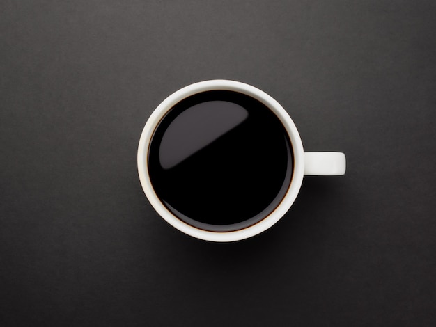 Close-up of black coffee in white cup