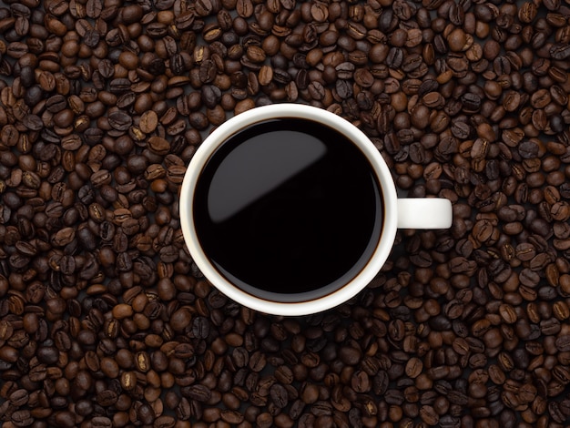 Close-up of black coffee in white cup