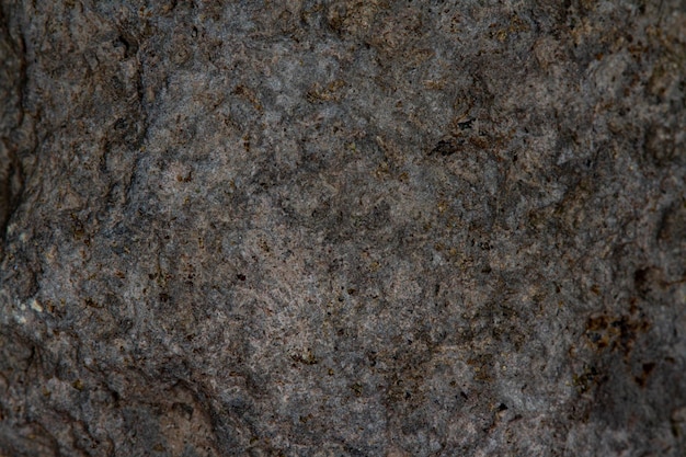 Close up Black lava stone texture for stone skin background