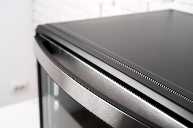 Close up of black mini electric oven home appliance