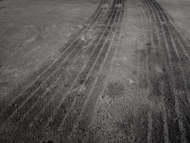 Close up black tire marks on cement floor