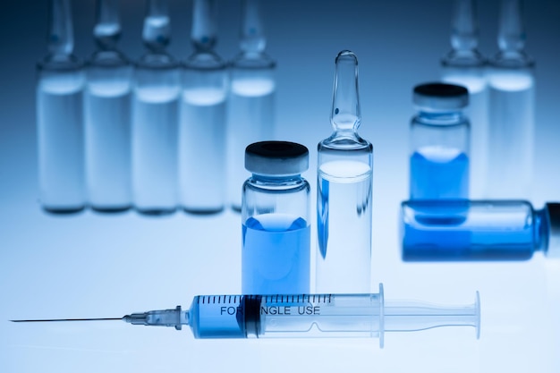 Close-up of blue bottles on table