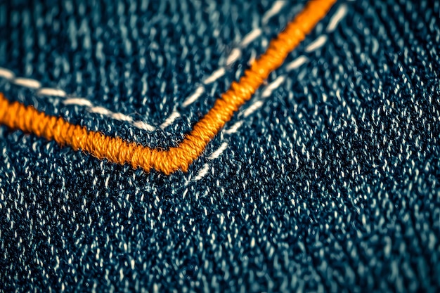 Photo a close up of a blue jean jacket with a line on it