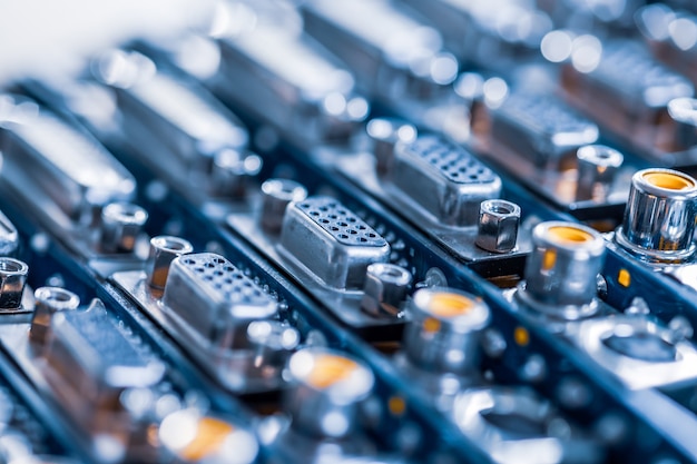 Close-up blurry metal sockets on a computer video board