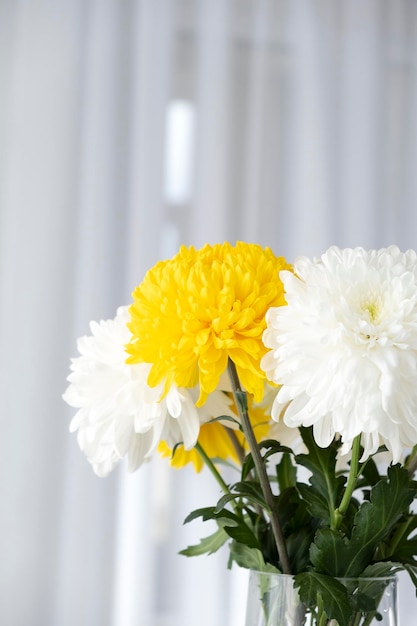 Close up bouquet of chrysanthemums with copy space Flower shop or bright greeting card for holidays Sunny mood Selective focus