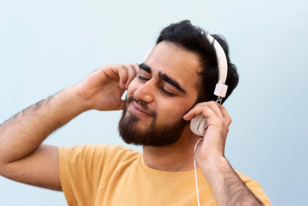 Close up boy listening to music