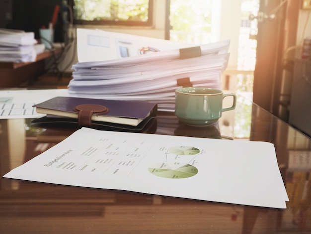 Photo close up of business documents stack on desk