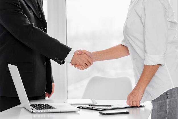 Close-up business hand shake at office