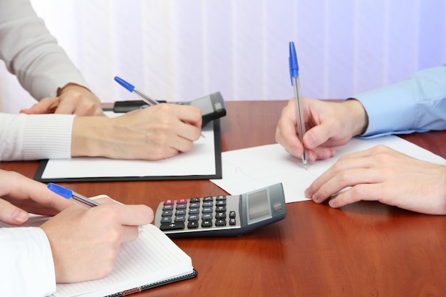 Close up of business people hands during teamwork