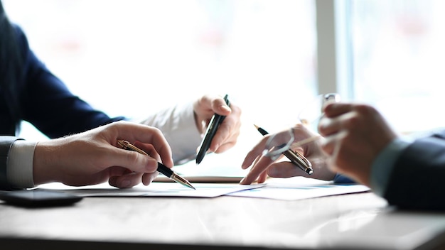 Close up business team at the desk in the office