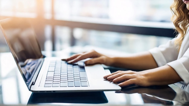 Close up business woman hand typing on laptop computer online working at office