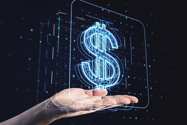 Close up of businessman hand holding glowing dollar hologram on dark background Money digital banking and finance concept