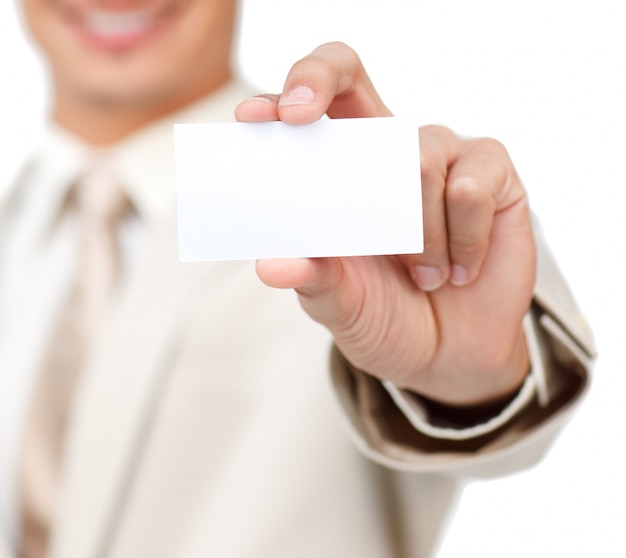 Close-up of a Businessman holding a white card 