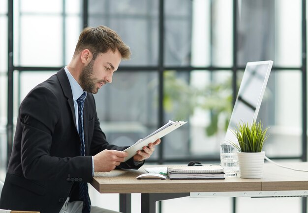 Close up of businessman taking folders from hand