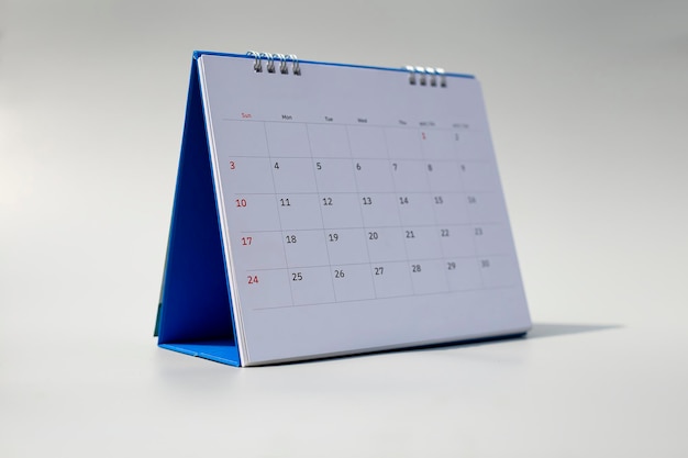 Close up of calendar on the table planning for business meeting or travel planning concept