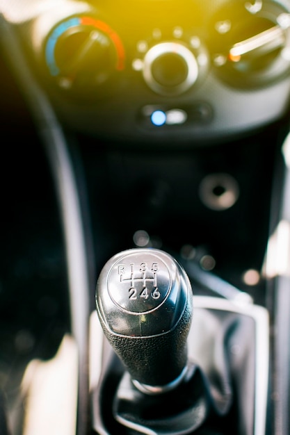 Close up of a car gear knob Detail view of a vehicle transmission lever Gear lever of a vehicle Closeup of a car gear lever