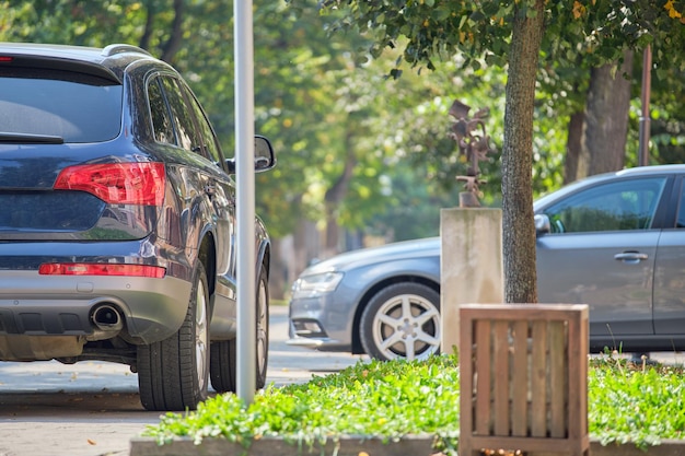 Close up of a car parked illegally against traffic rules on pedestrian city street side