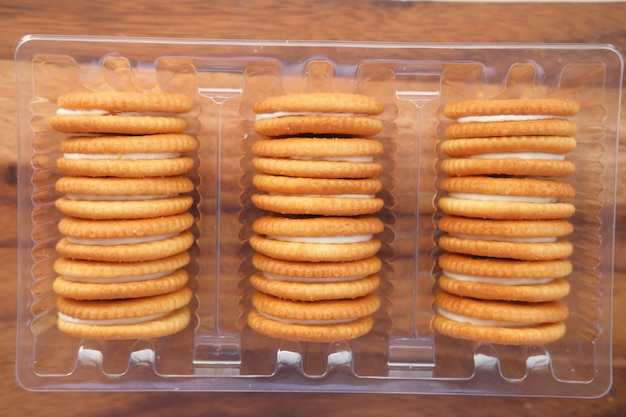 Close up of cheese cookies in a packer on table