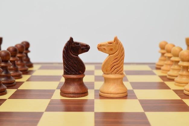 Close-up of chess against white background