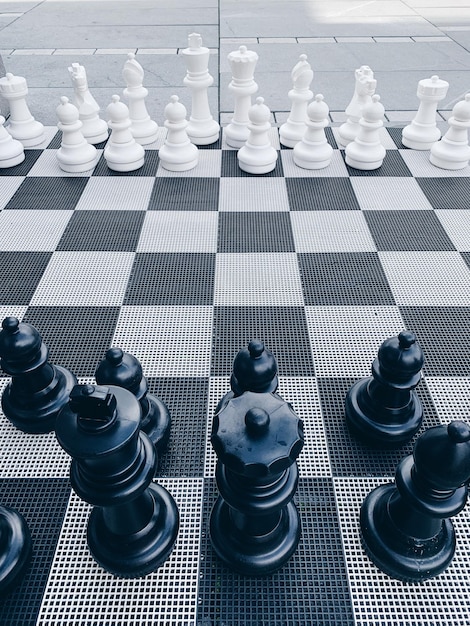 Close-up of chess pieces black and white with no people and copy space