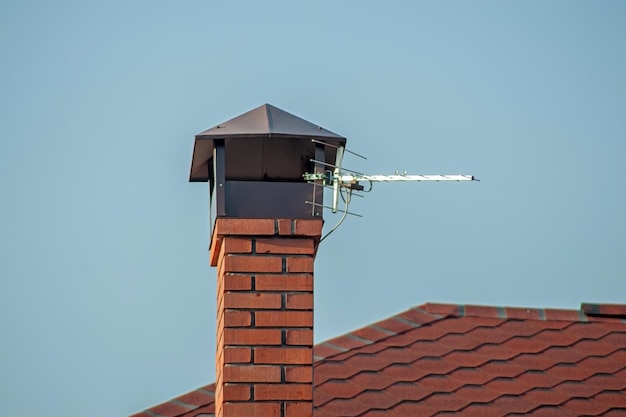 Close up chimney on the roof red brick