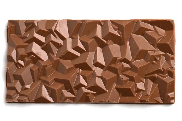 Close up a chocolate bar isolated on white Homemade chocolate bar in polygonal shape Chocolate confectionery