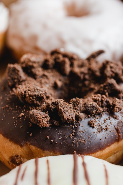 Close up of a chocolate donut in a box