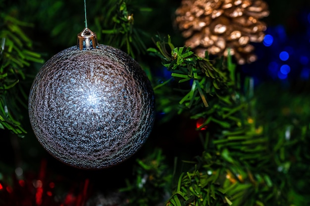 Photo close-up of christmas decoration hanging on tree