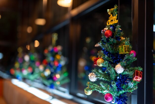 Close-up of Christmas decorations. Red and gold balls on a Christmas tree.