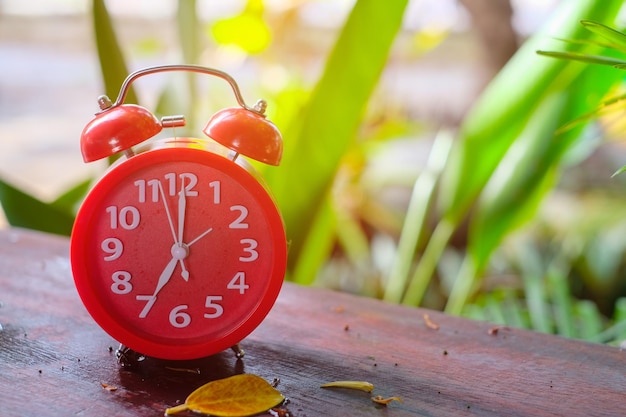 Close-up of clock on table