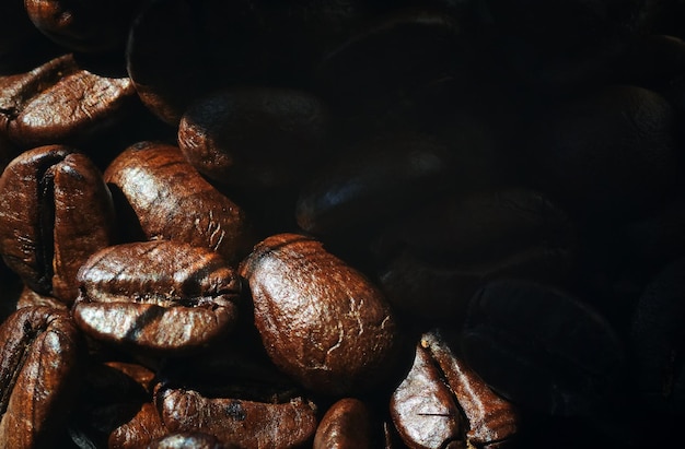 A close up of coffee beans in a bowl