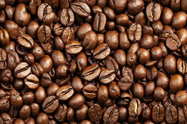 A close up of coffee beans with the word coffee on it