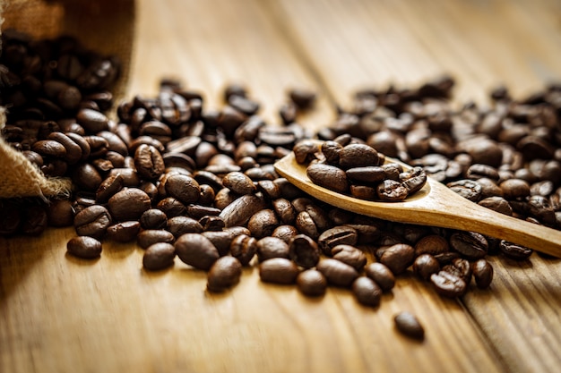 Close-up coffee beans on wooden.