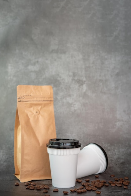 Close-up of coffee cup on table against wall