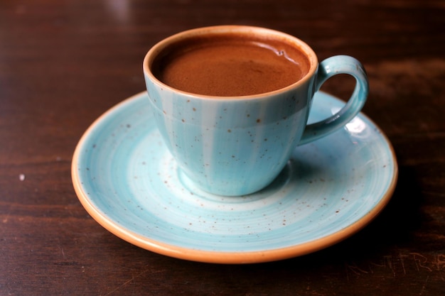 Close-up of coffee cup on table