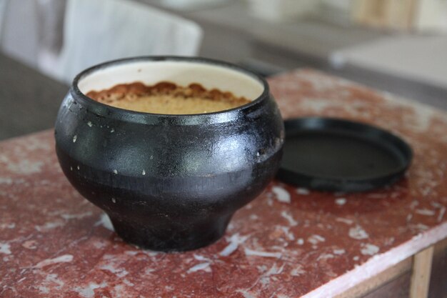 Close-up of coffee cup on table